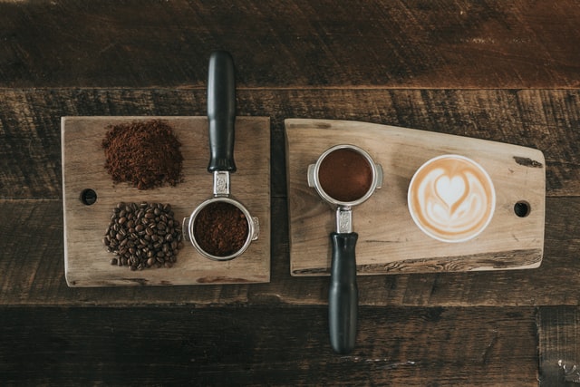 coffee powder, bean, and a cup of coffee as main background image